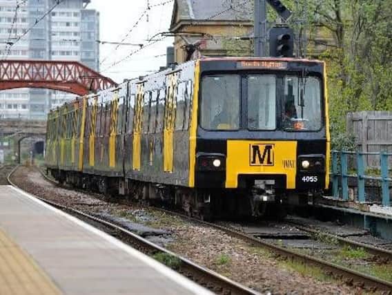 Trains are delayed after an unconscious person was taken to hospital by ambulance crews.
