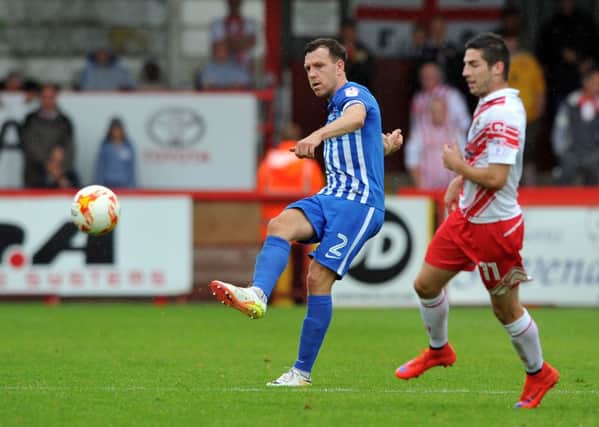Carl Magnay (left) clears the ball for Pools in their defeat at Stevenage. Picture by Frank Reid