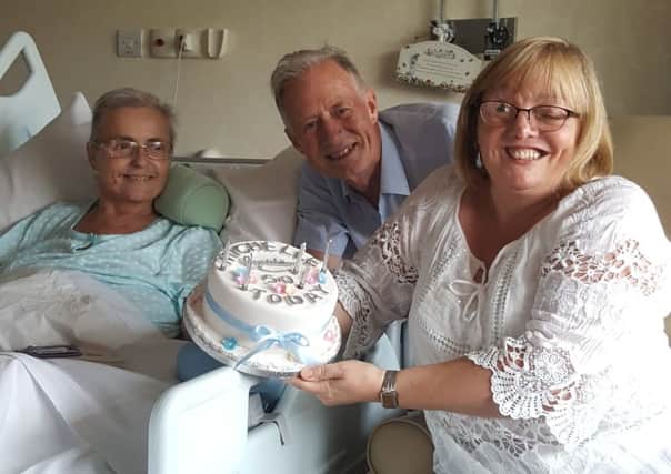 Michelle Willis celebrates her 50th birthday with parents Thomas and Linda.