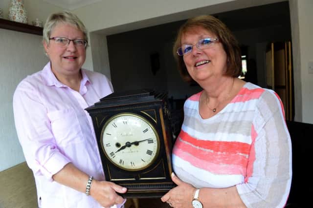 Gwen Young and Lynda Clark with the Gowlands clock