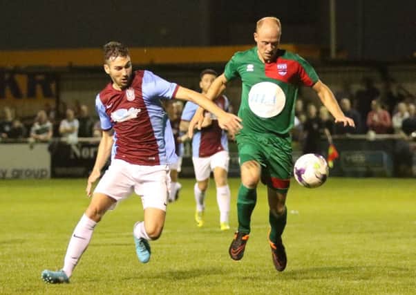 Washington (green) battle against South Shields in last night's 3-1 Northern League defeat. Picture by Peter Talbot