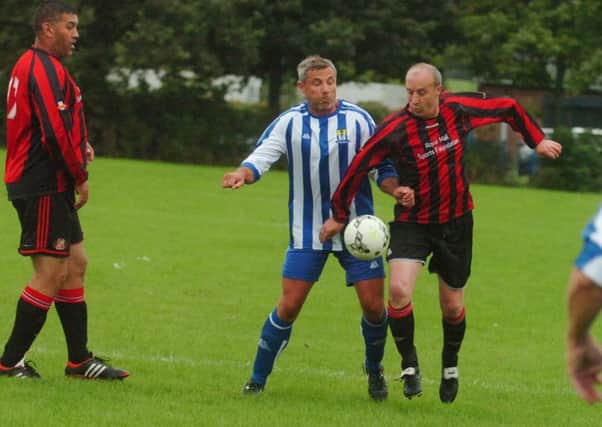 Oddies (red/black) take on Willow Pond in the Over-40s League last week