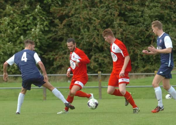 Washington (red) take on Shildon in last week's FA Cup first qualifying round tie