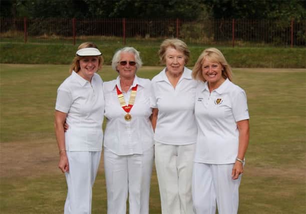 Town pairs winners Lorraine Breheny (left) and Charlotte Bayliss (right) with SWBA president Gwen Eltringham and singles champion of champion winner Jean Graham