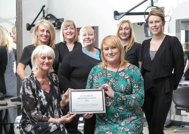 East Durham College hairdressing staff with an award they received earlier this year.