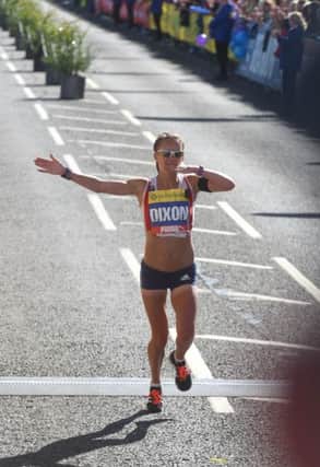 Sunderland's Alyson Dixon crosses the line at the Great North Run last year, doing the "Borini". Picture by Kevin Brady