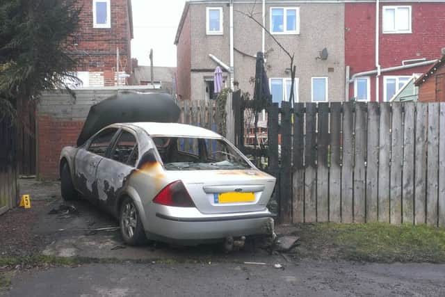 The burned out car believed to be linked to the robbery of the TSB bank in Horden.