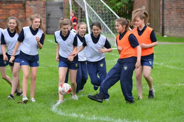 SAFC players visit St Anthonys Catholic Girls Academy.