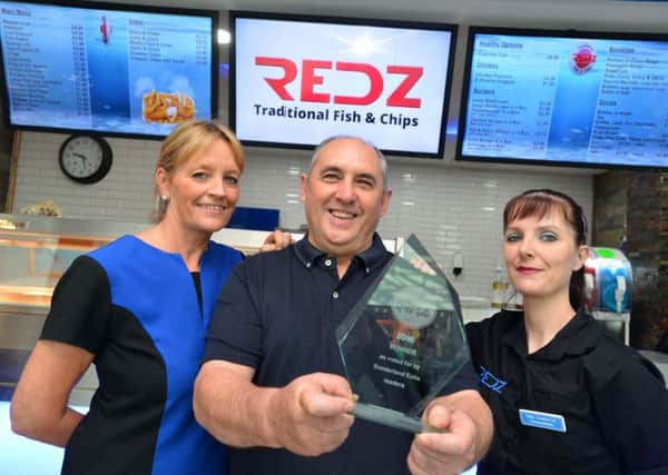 Redz fish and chips, winner of Echo's Chippy of the Year cpmpetition.
From left owner's Wendy Redford, George Redford and manageress Sharon Lee