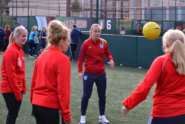 Beth Mead gets involved in the session at Sunderland College.