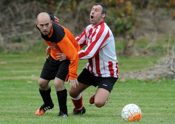 Wearmouth Old Boys (red and white) take on Roseberry Grange in the Over-40s League last week