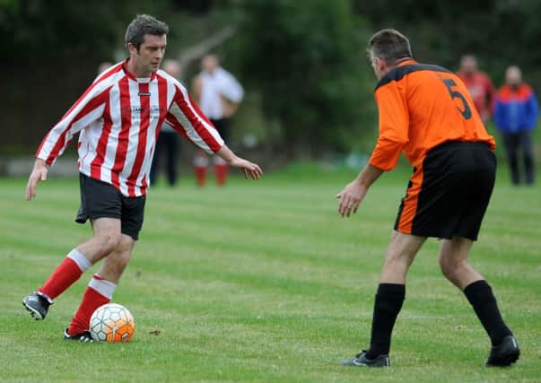 Wearmouth Old Boys (red and white) take on Roseberry Grange in the Over-40s League last weekend