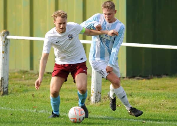 Ashbrooke Belford House (pale blue and white stripes) take on South Shields Reserves in last weekend's Monkwearmouth Cup tie
