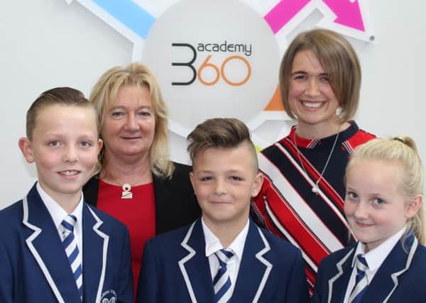 Phil Marshall (back left) and Rachel Donohue pictured with Academy 360 pupils Stephen Ellwood, Warren Hodgson and Brooke Hodgson.