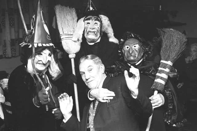 Members of the Suffolk Street Over 60 Club at their halloween party.  Party organiser Mr Tom Hopper with some of the ghoulies. 29 October 1980