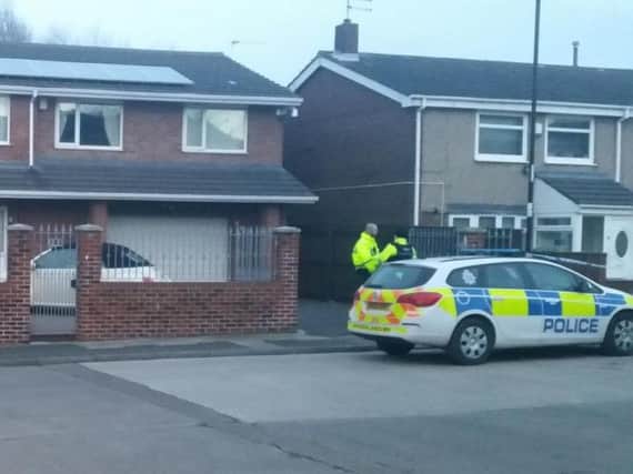 Police at a house after the shooting incident in Edgmond Court, Hollycarrside, in February.