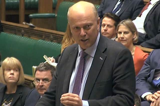 Transport Secretary Chris Grayling tells the House of Commons a third runway at Heathrow has been given the go-ahead.