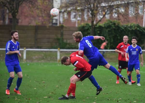 Silksworth CW (red) come under pressure against Richmond Town on Saturday. Picture by Kevin Brady