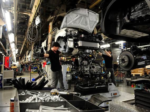 Workers at Nissan working on the Qashqai in Sunderland. Picture: Press Association.
