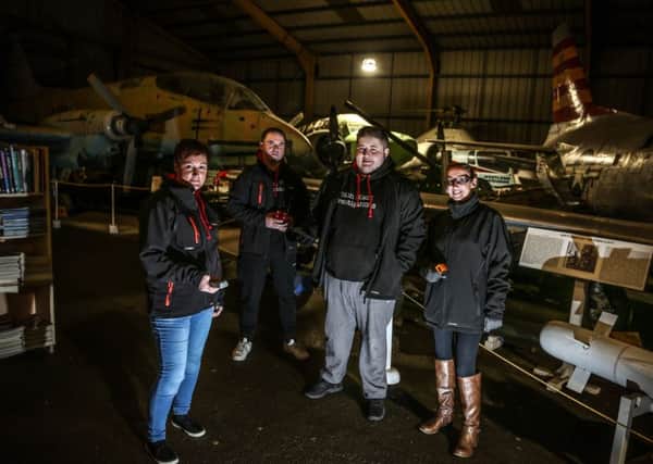 Members of the Pitch Black Investigations team, Carrie Archibald, Steve Archibald, Owen Pendlington and Cam Walton on a ghost hunt in the North East Aircraft Museum. Picture: TOM BANKS