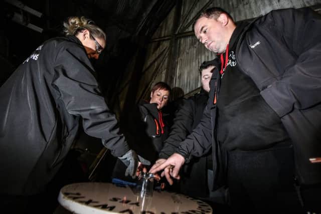Members of the Pitch Black Investigations team, Cam Walton, Steve Archibald, Owen Pendlington and Carrie Archibald on a ghost hunt in the North East Aircraft Museum. Picture: TOM BANKS
