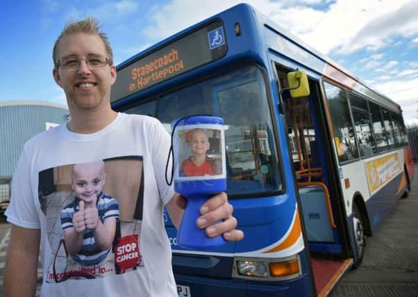 Bus driver Ian Thompson during his fundraising for Bradley Lowery.