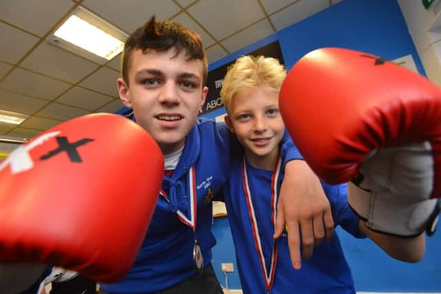 North Star Boxing Club gold medal champions.  Jimmy Stevens (left), aged 13, and Danny Hopper. aged 11. Picture by Stu Norton