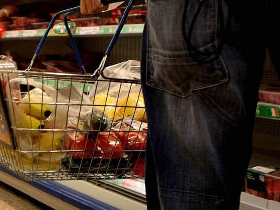 The cost of a basket of groceries is still more than 2% cheaper than this time last year despite a slight increase on last month. Picture: Press Association.