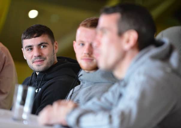 Lewis Ritson listens as Martin Ward (right) speaks at today's press conference at Rainton Meadows Arena. Picture by STU NORTON