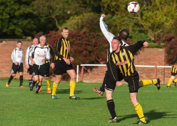 Seaham Marlborough (white shirts) battle against Dubmire in the Over-40s League at Dawdon Welfare Park last weekend,. Picture by Kevin Brady