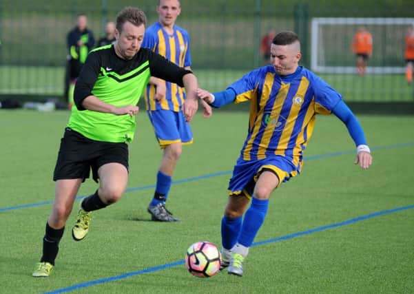 Wear United (blue and yellow) take on Penshaw CC in the Sunderland Sunday League last week, on the new 3G pitch at Silksworth. Picture by Tim Richardson