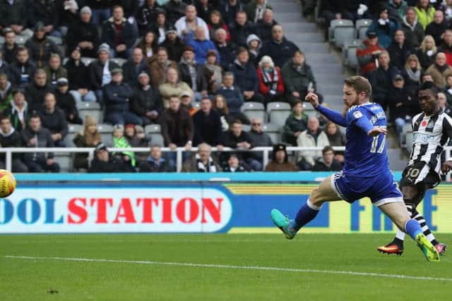Christian Atsu slams home his opener for Newcastle against Cardiff