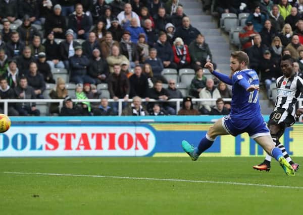 Christian Atsu slams home his opener for Newcastle against Cardiff