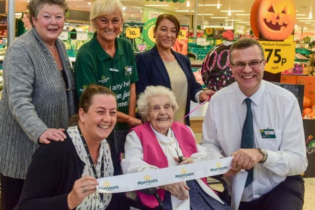 Cutting the ribbon to re-launch the Morrisons supermarket at Doxford Park, Sunderland, on Wednesday, was 100-year-old Charlotte Deacon, pictured with l-r front Gillian Ridley of Morrison and store manager Neil Thornton. Standing are Anne Swales a family friend of Charlottes, Ali Smart of Morrisons and Susan Foster family friend of Charlotte's.