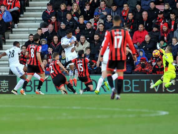 Victor Anichebe (left) fires past Artur Boric for Sunderland's first goal. Picture by FRANK REID