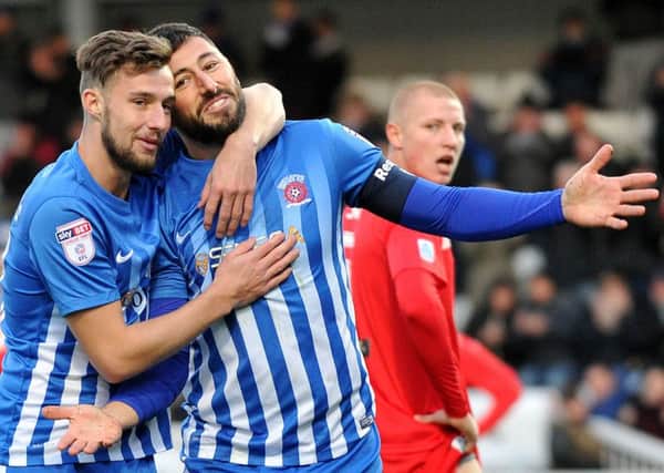 Billy Paynter (right) celebrates making it 3-0 for Pools against Stamford. Picture by Frank Reid