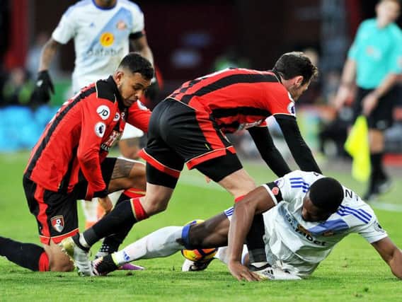 Down but not out: Victor Anichebe battling with Bournemouth. Picture by FRANK REID