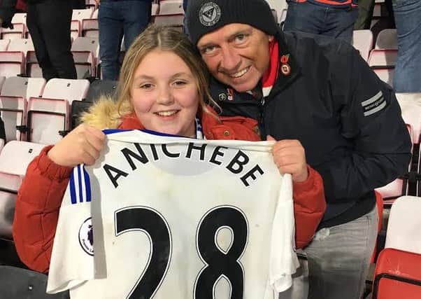 Leah Pratt alongside great uncle Kevin Simpson after she was given Victor Anichebe's shirt following the 2-1 win against Bournemouth.