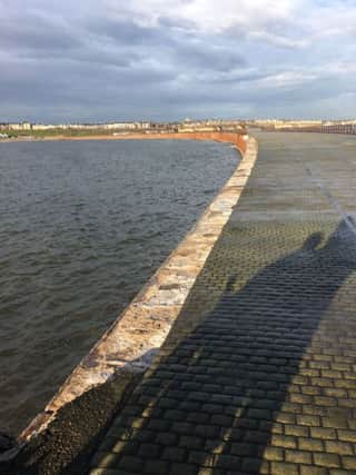 Railings have gone from part of Roker Pier, close to its lighthouse.