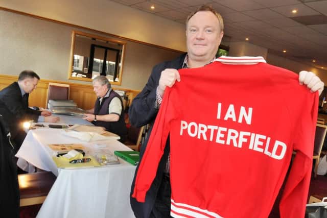 Michael Ganley with a jacket worn by legend Ian Porterfield before the 1973 FA Cup final.