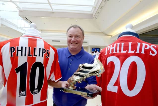 SAFC Museum's Michael Ganley with Sunderland legend Kevin Phillips' golden boot.