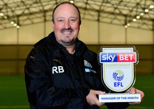Newcastle United boss Rafael Benitez hoists the Sky Bet Championship manager of the month award. Picture by Joe Meredith/JMP