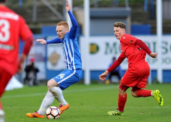 Hartlepool United's Michael Woods (left) looks to create against Stamford in last week's FA Cup tie. Picture by Frank Reid