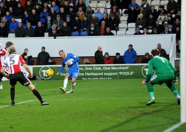 Lewis Alessandra curls home Pools' opening goal against Cheltenham. Picture by Frank Reid