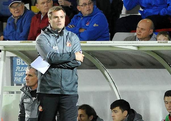 Sunderland first-team coach Robbie Stockdale casts an eye over the Under-23s in a recent game.