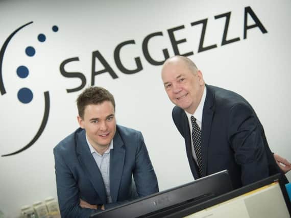Saggezza managing director of UKoperations Martin Williams (left) with Sunderland City Council leader Coun Paul Watson