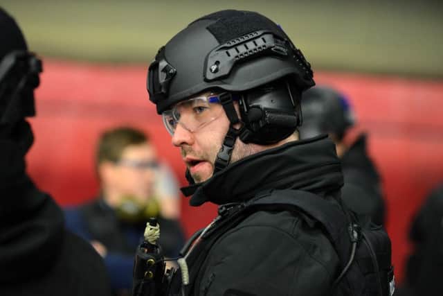 An officer taking part in a training excercise at Operational Tactical Training Centre.