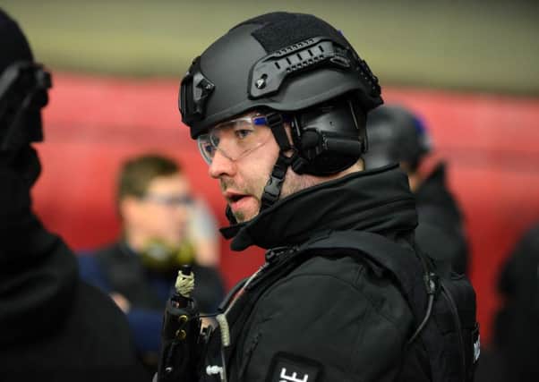 An officer taking part in a training excercise at Operational Tactical Training Centre.