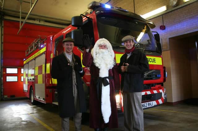 Santa with firefighters