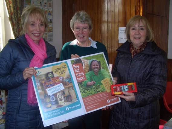 Anne Farrow with Councillor Gillian Galbraith and Ann Scott advertising the Fairtrade stall at the recent coffee morning held in Middle Herrington Methodist Church.
